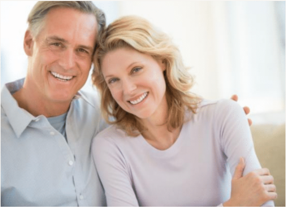 Older couple sitting together on couch Sioux City Dentist